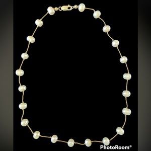 Pearl necklace on string with 925 sterling silver clasp